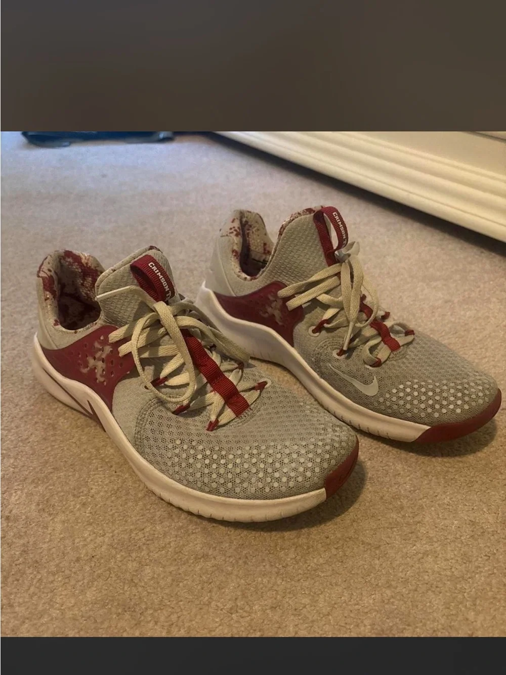 Nike men’s Light Gray and Burgundy Athletic Sneakers